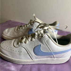 Nike White Sneakers with Blue Swoosh